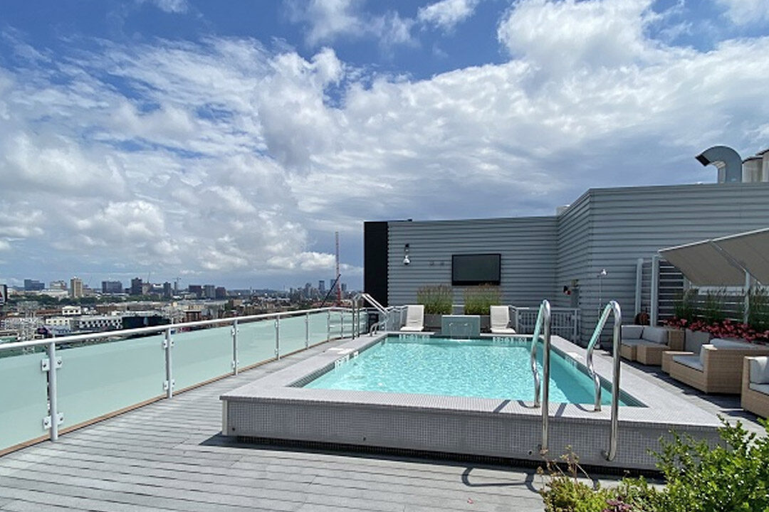 Beautiful pool area with skyline views.