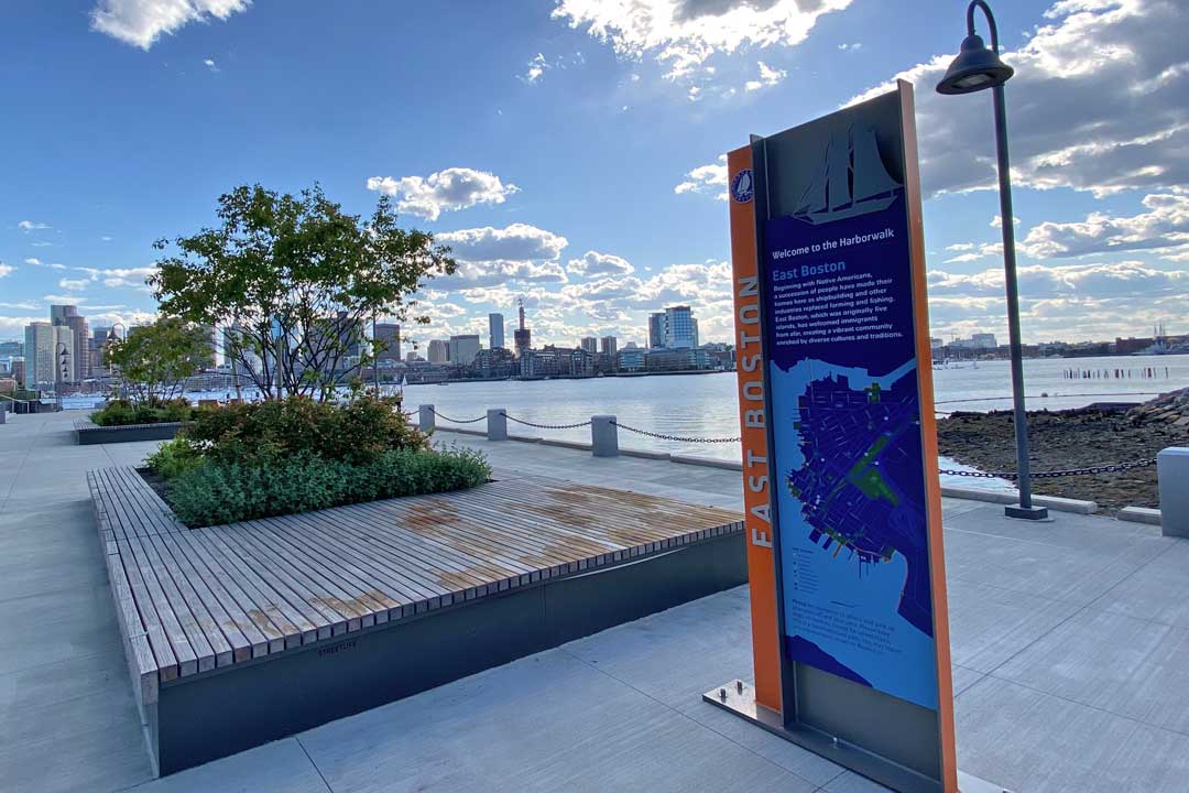 A sprawling waterfront park with skyline views of Downtown Boston