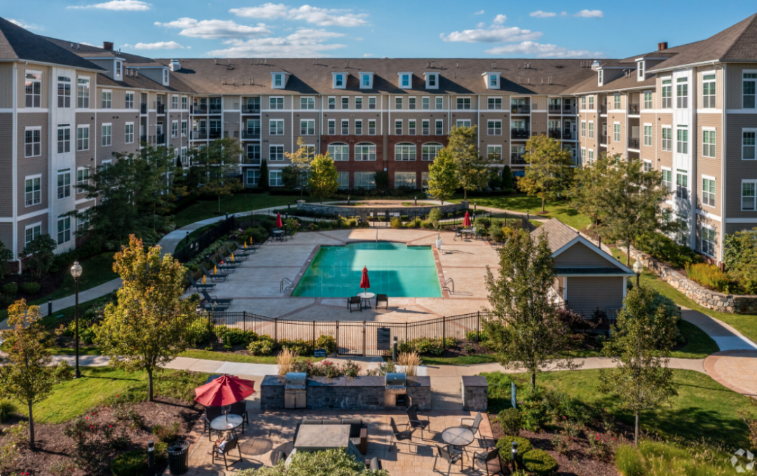 exterior area with outdoor pool and patio