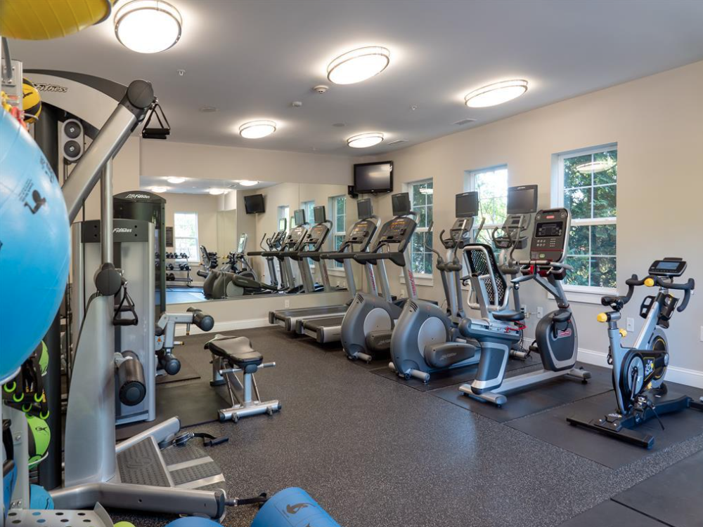 Large fitness center offering a variety of equipment.