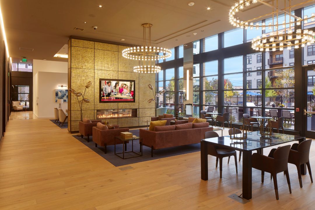 lobby area with bright lights , couches and tv 1 Superior Drive