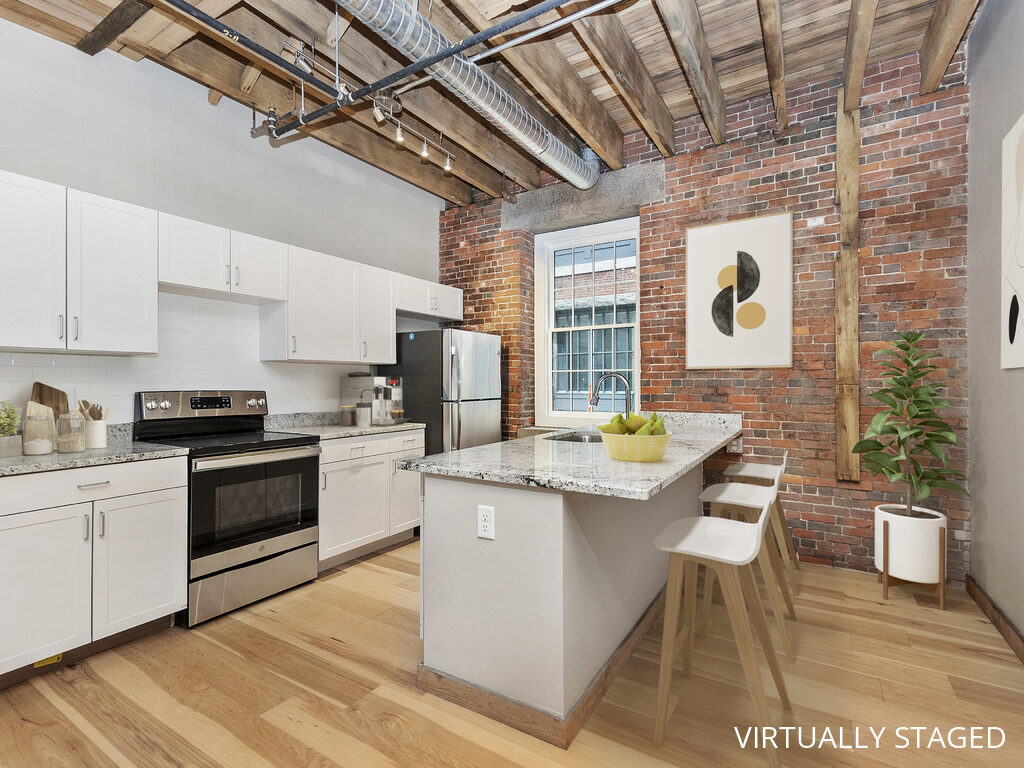 loft style kitchen with center island for seating