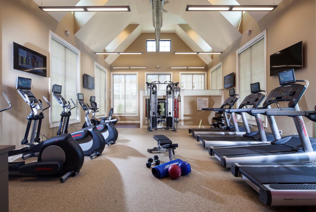 bright and open fitness center with workout equipment
