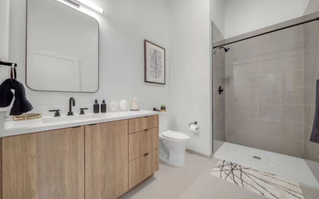 Bathroom with wood and black accents