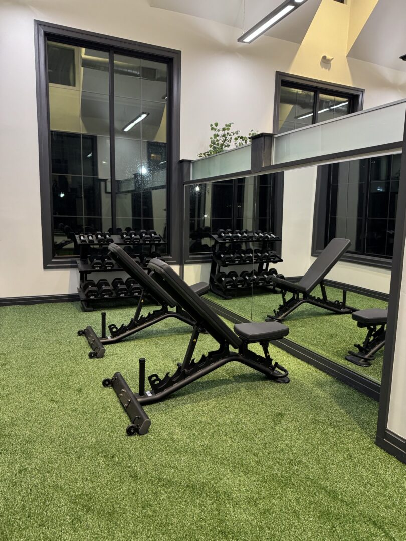 fitness center with an assortment of workout equipment