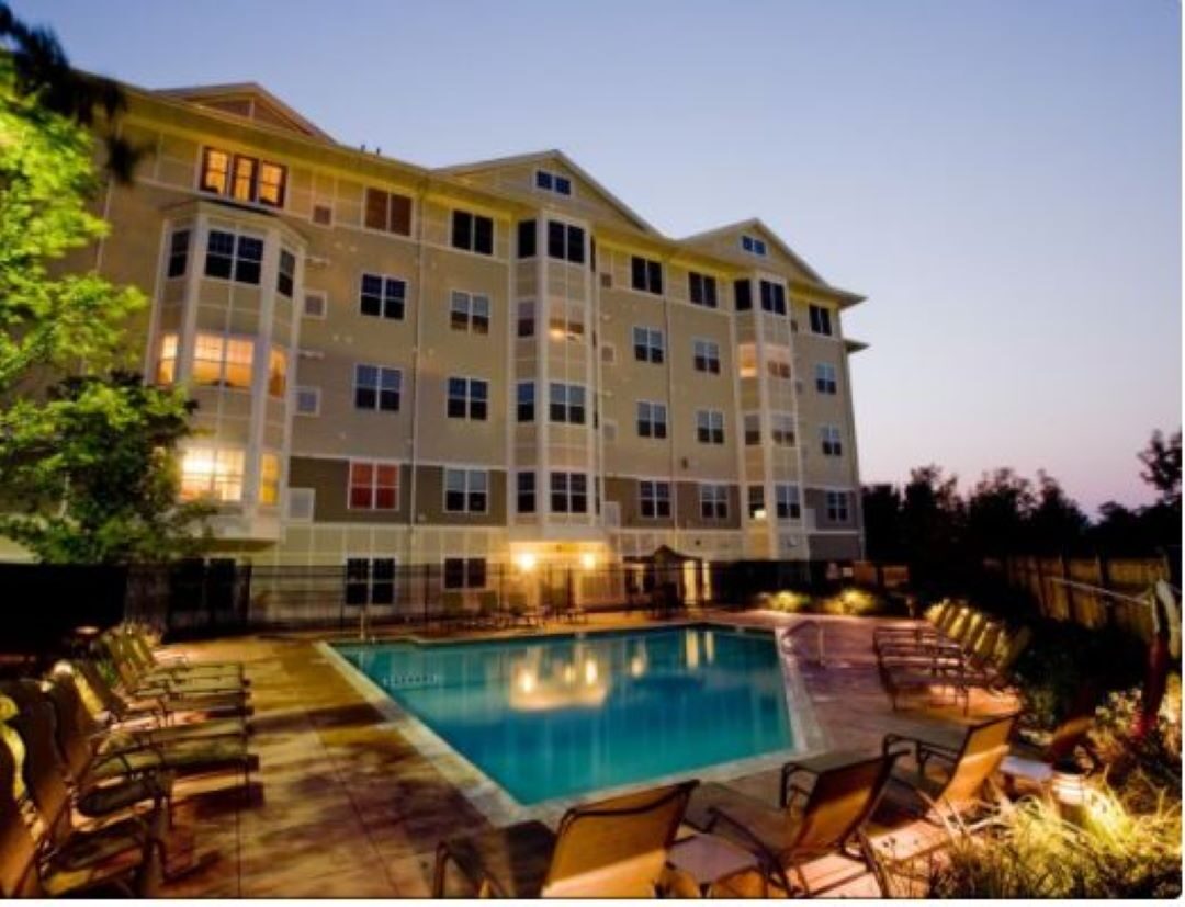 exterior building and outdoor pool area at 1 Windsor Woods Lane