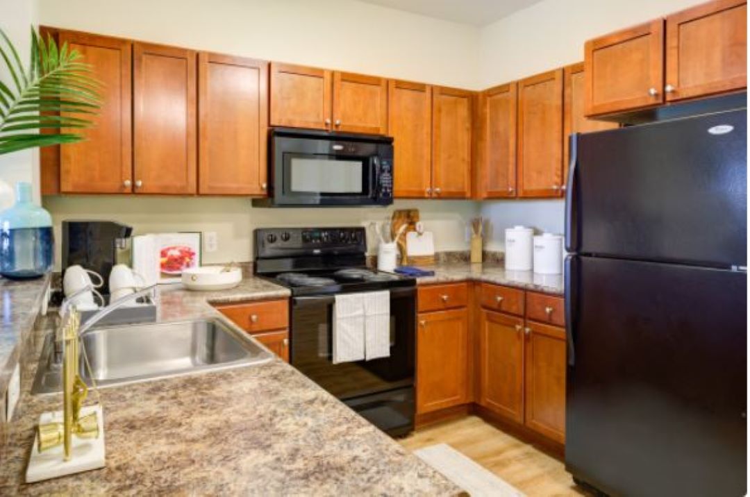 modern kitchen with hardwood floors at 1 Windsor Woods Lanekitchen