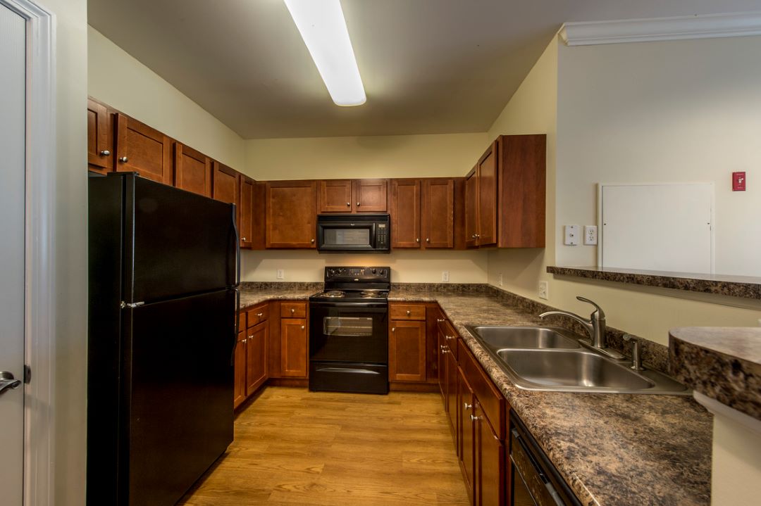 updated kitchen with hardwood floors at 311 Lowell St