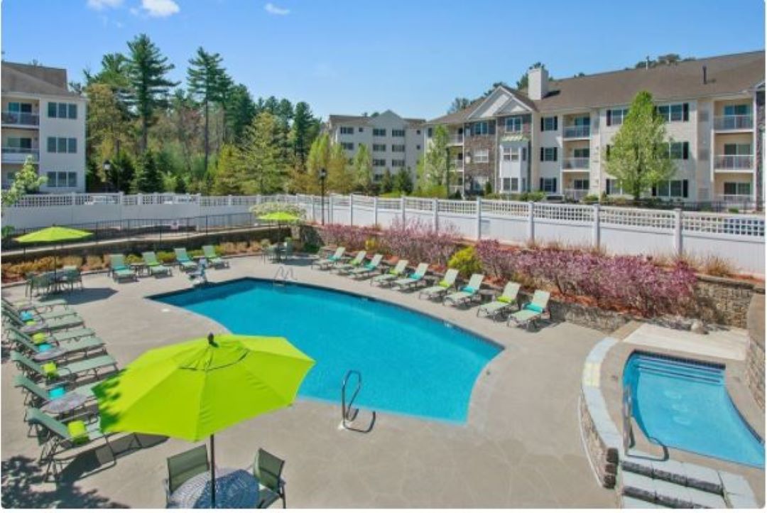 outdoor pool and patio area at 100 Thompson Farm