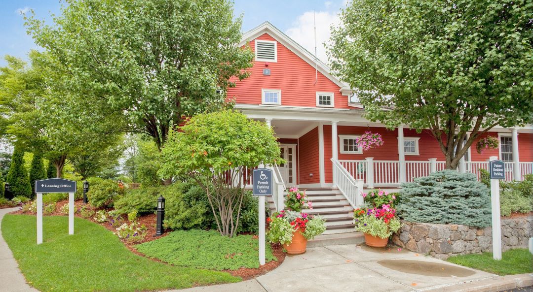 Landscaped main entrance to property