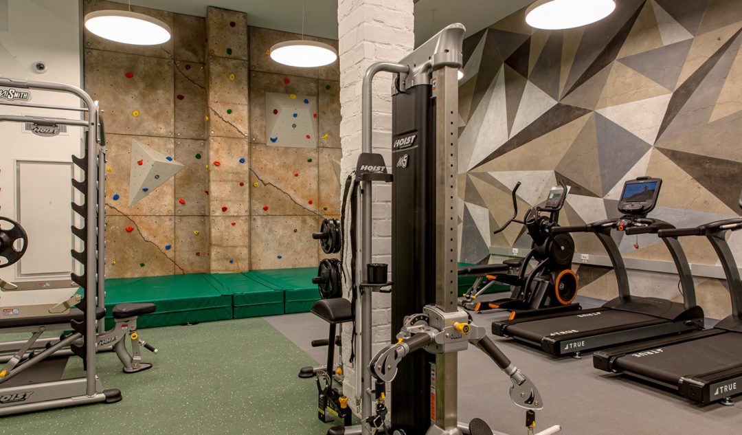Fitness center featuring rock wall
