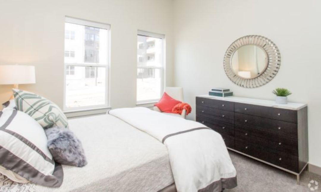 Bedroom with rugged floors