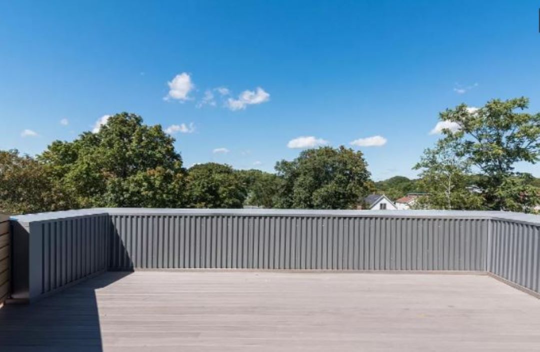 large roof top deck at 3383 Washington Street