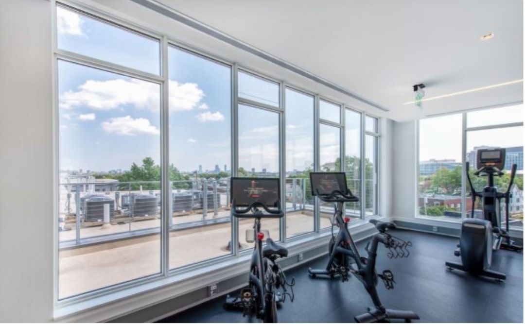 fitness center with large windows at 530 Western Avenue