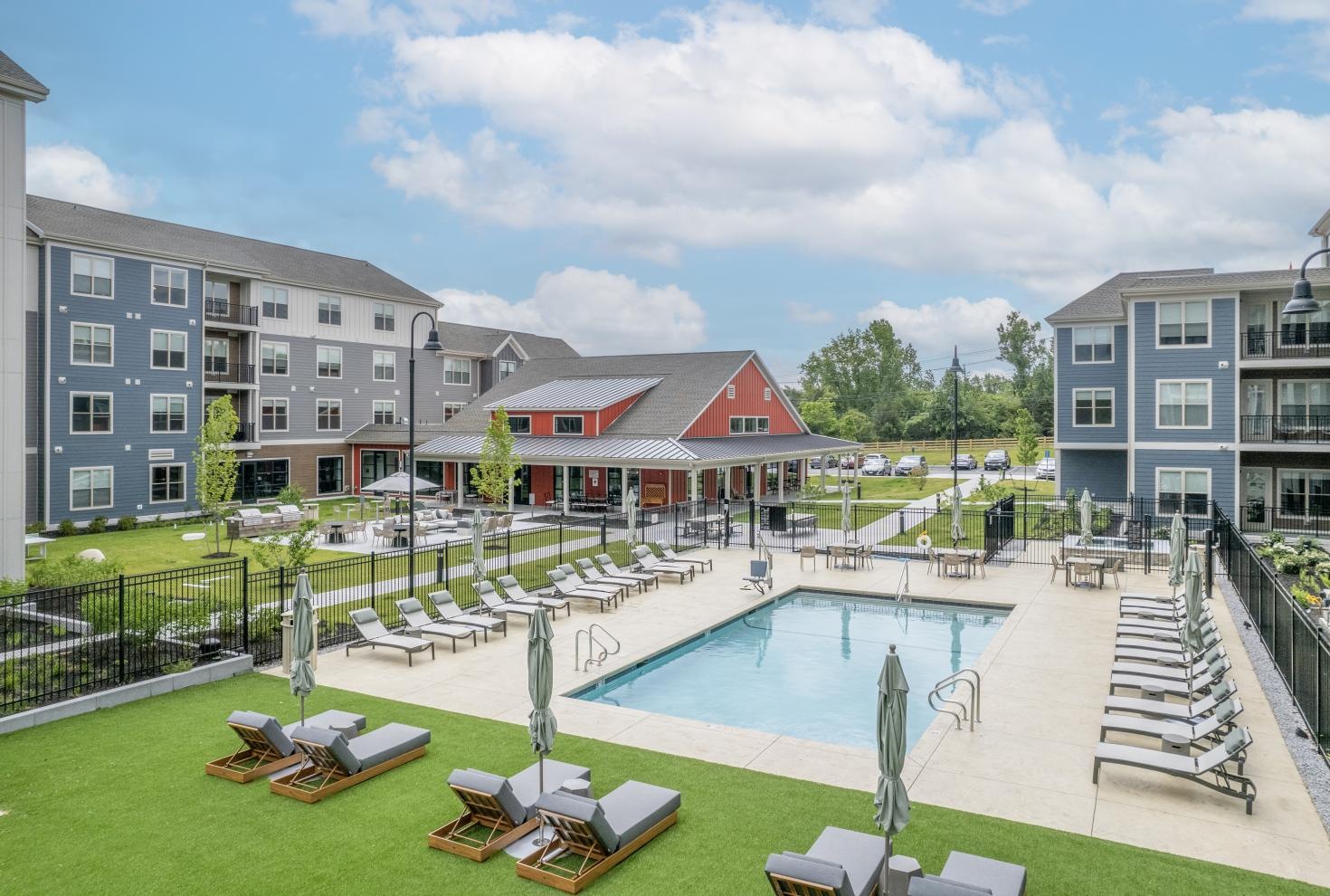 outdoor pool with lounge seating