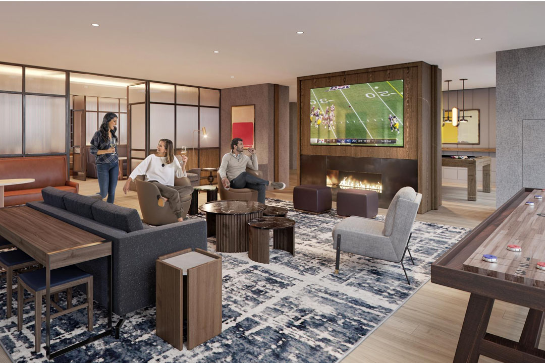 Beautiful common area lounges with flat screen TV, couches, shuffle board and billiards table, and a fireplace.
