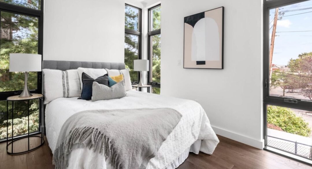 Bright Bedroom with large windowns