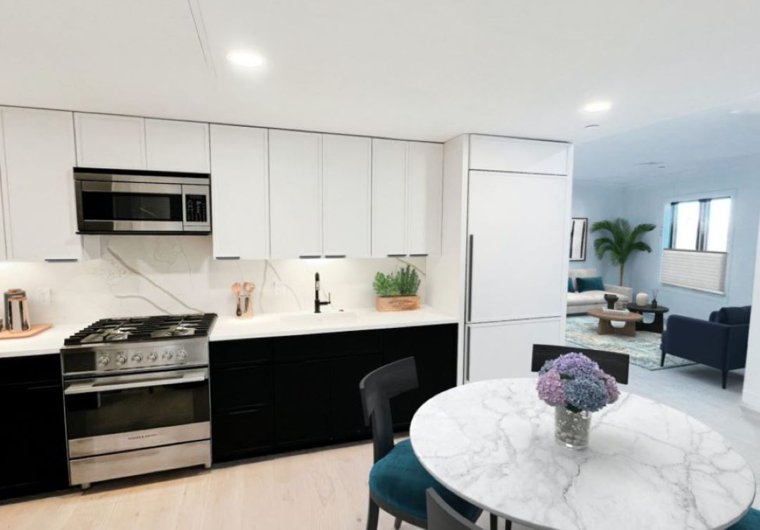 View of Kitchen with Living Area