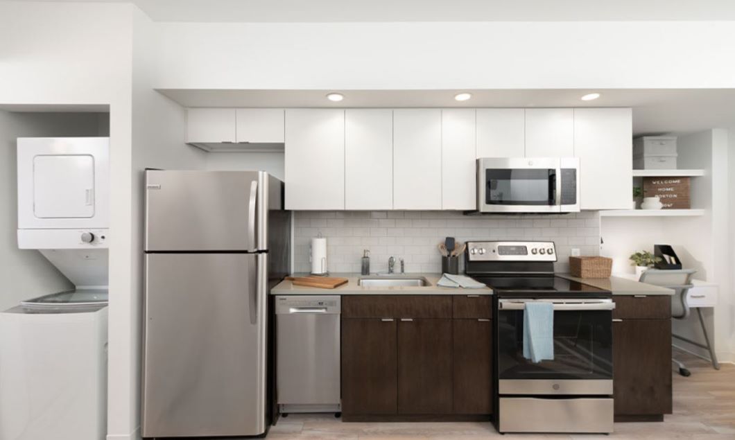 Modern kitchen with laundry and office desk