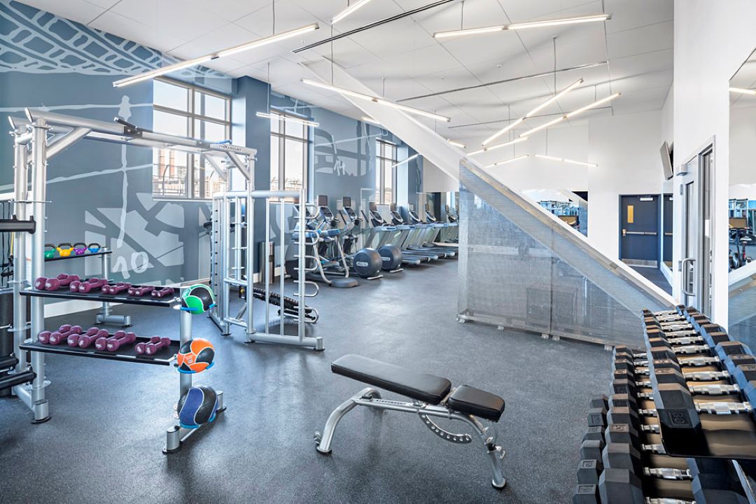 Large fitness center offering a variety of equipment