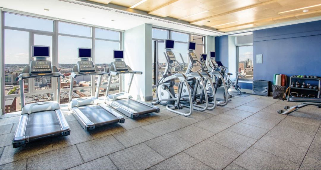 Large fitness center offering a variety of equipment.