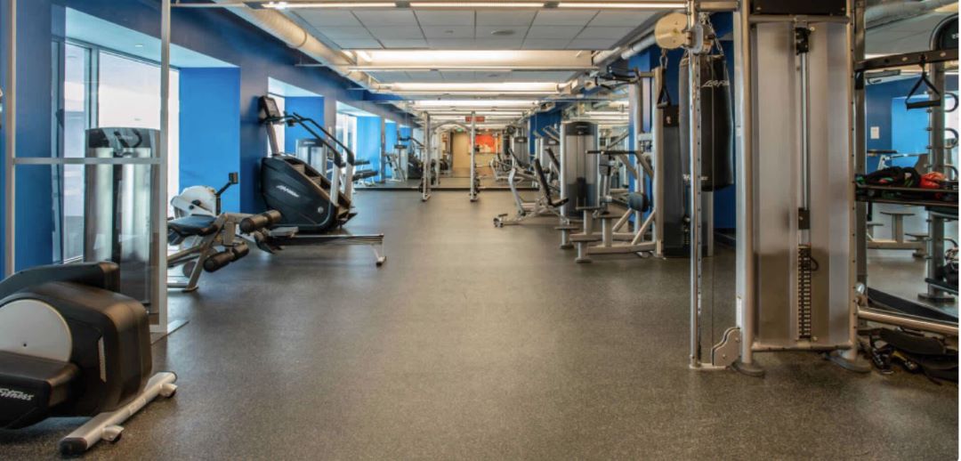 Large fitness center offering a variety of equipment.