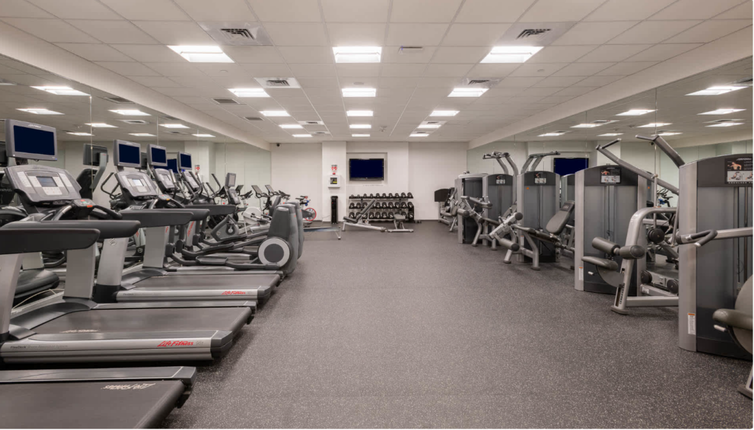 Large fitness center offering a variety of equipment.