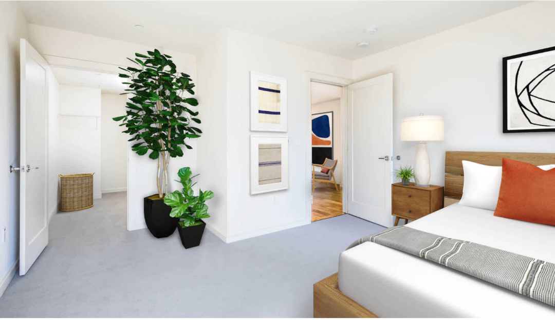 small white bedroom with carpet