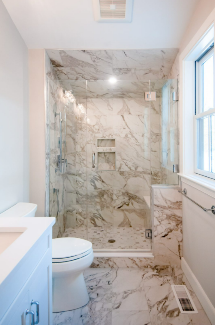 Bathroom with marble shower stall