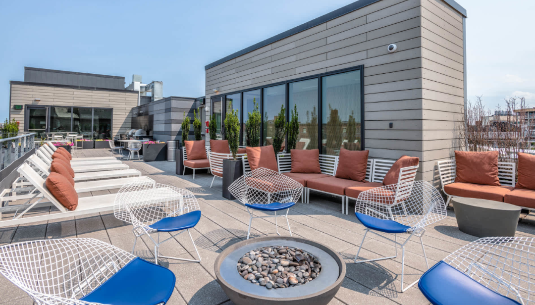 rooftop terrace with grills and firepit