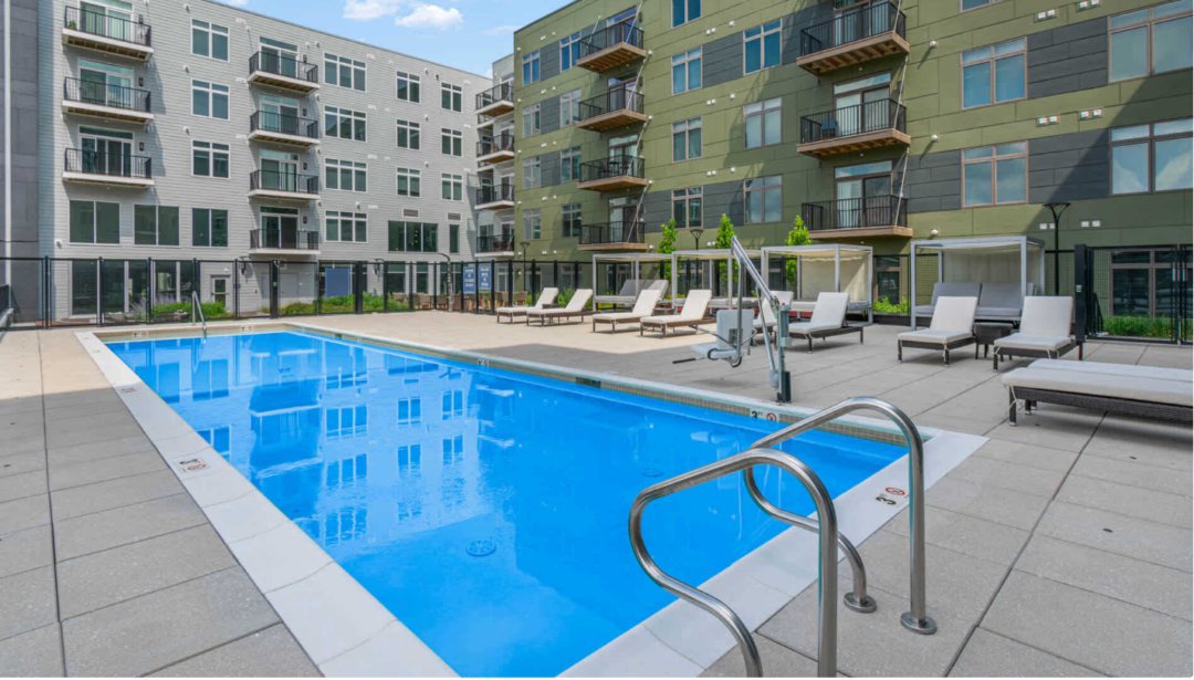 Big, Beautiful pool surrounded by outdoor deck/patio space