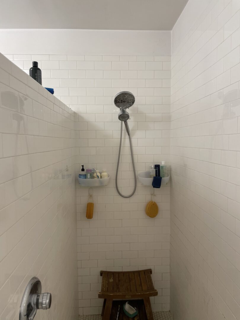 modern stand up shower with white tile