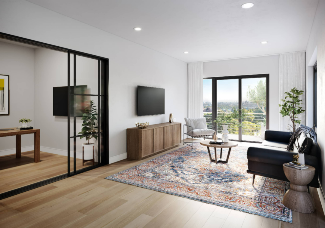 Open floor plan living room with hardwood floors and ceiling-to-floor windows