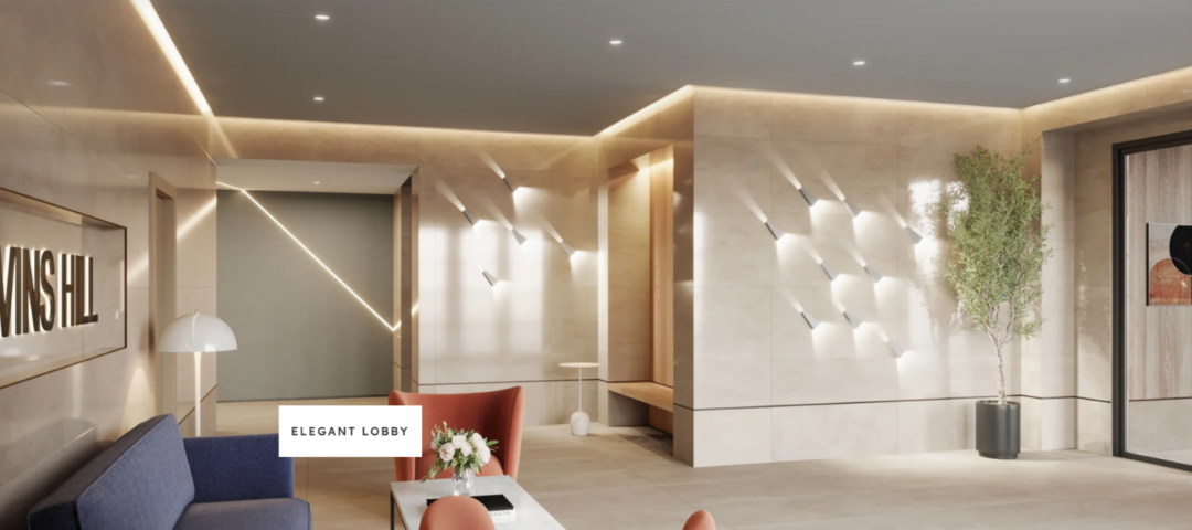 Lobby with seating area and elevator access