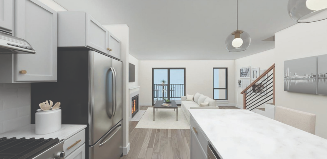 Open floor plan layout of kitchen leading to living room