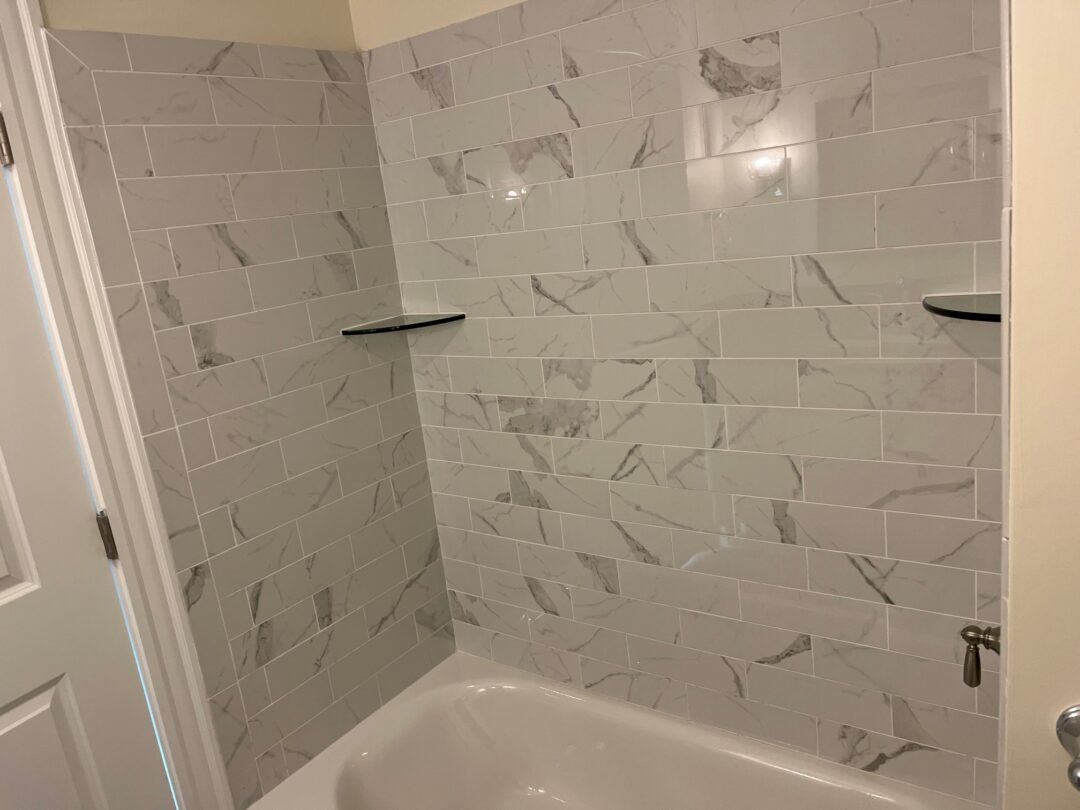 Bathroom with tub stall at Maplewood School Condos