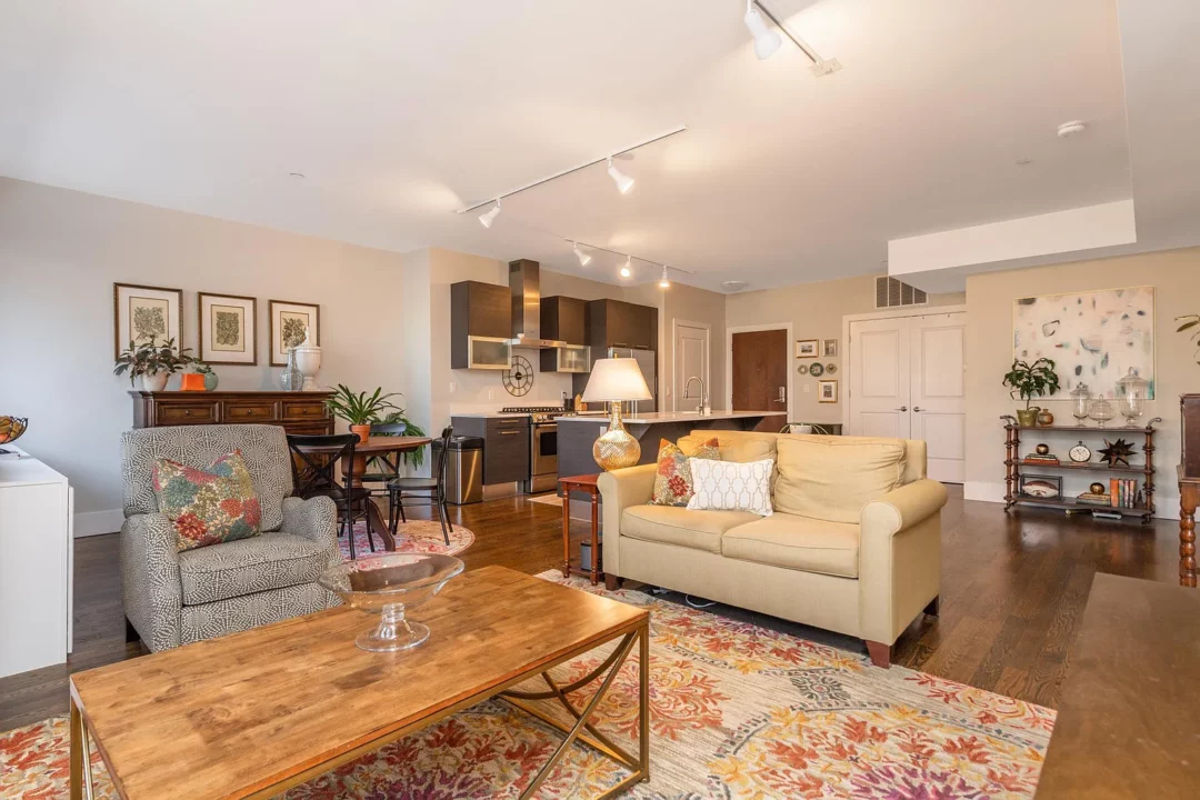 Open floor living room going into kitchen and dining room