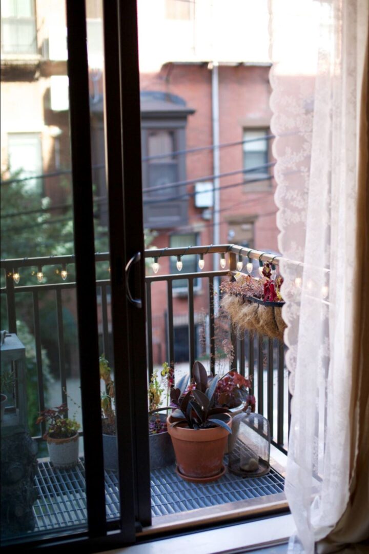 balcony off living area with slider