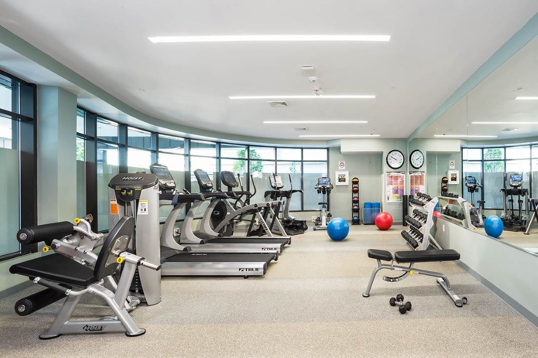 Large fitness center offering a variety of equipment.