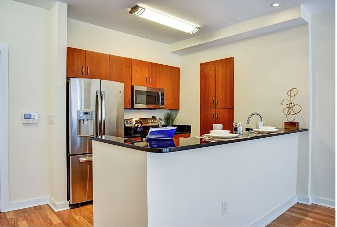 updated kitchen with designer cabinets and stainless appliances