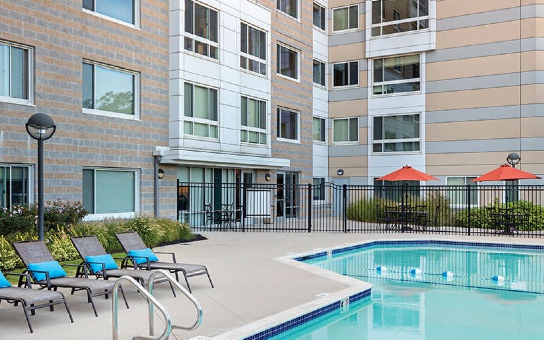 Big, Beautiful pool surrounded by outdoor deck/patio space