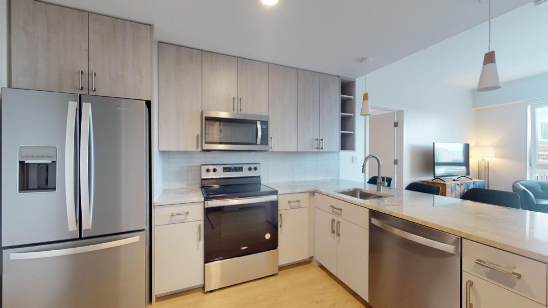 Kitchen with stove/oven, dishwasher, and refrigerator