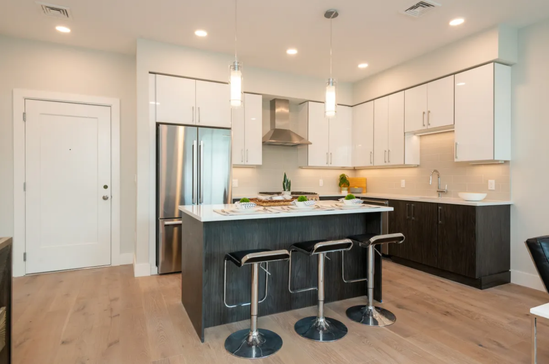 Kitchen with hardwood floors and island
