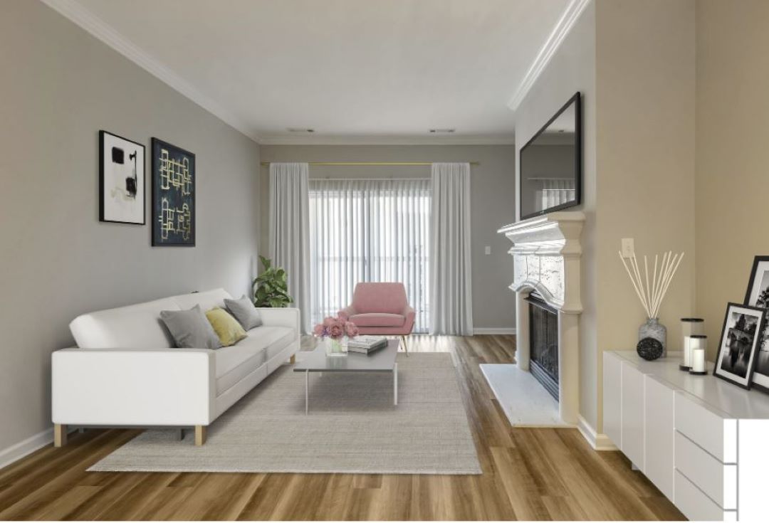 open concept living area with hardwood floors and large window