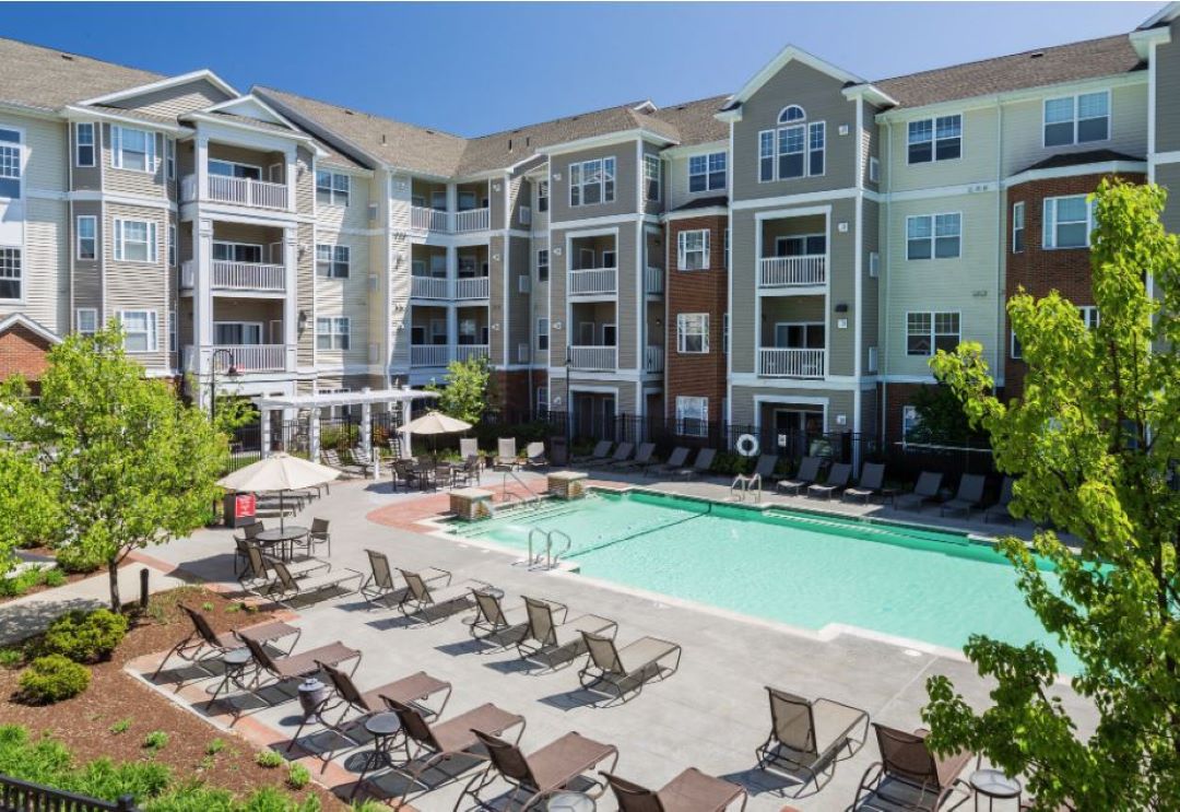 Big, Beautiful pool surrounded by outdoor deck/patio space