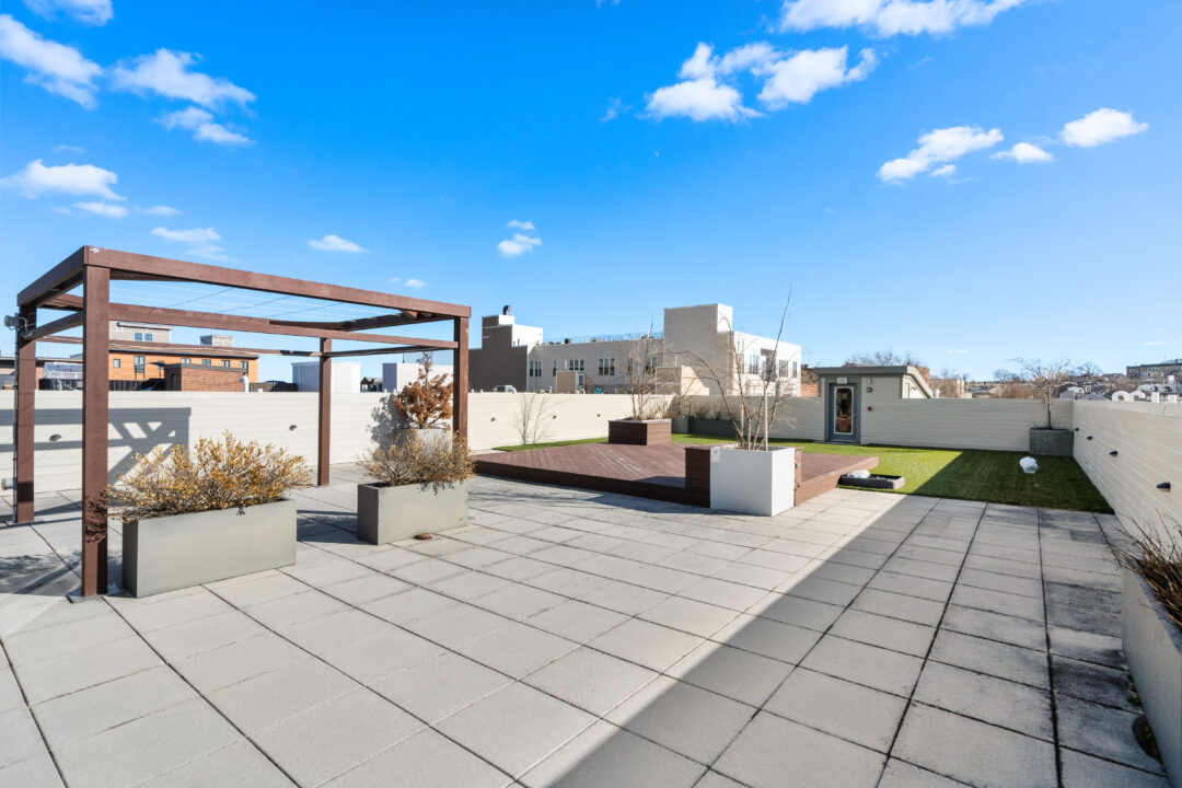 rooftop deck with patio and skyline views