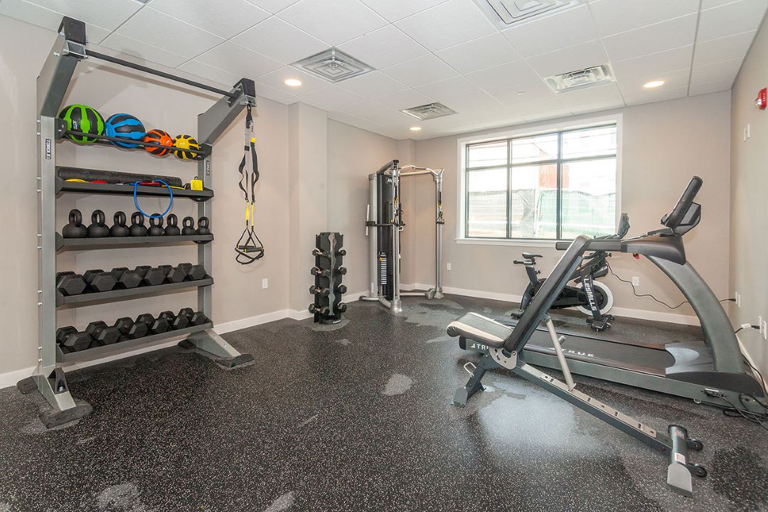 Large fitness center offering a variety of equipment.