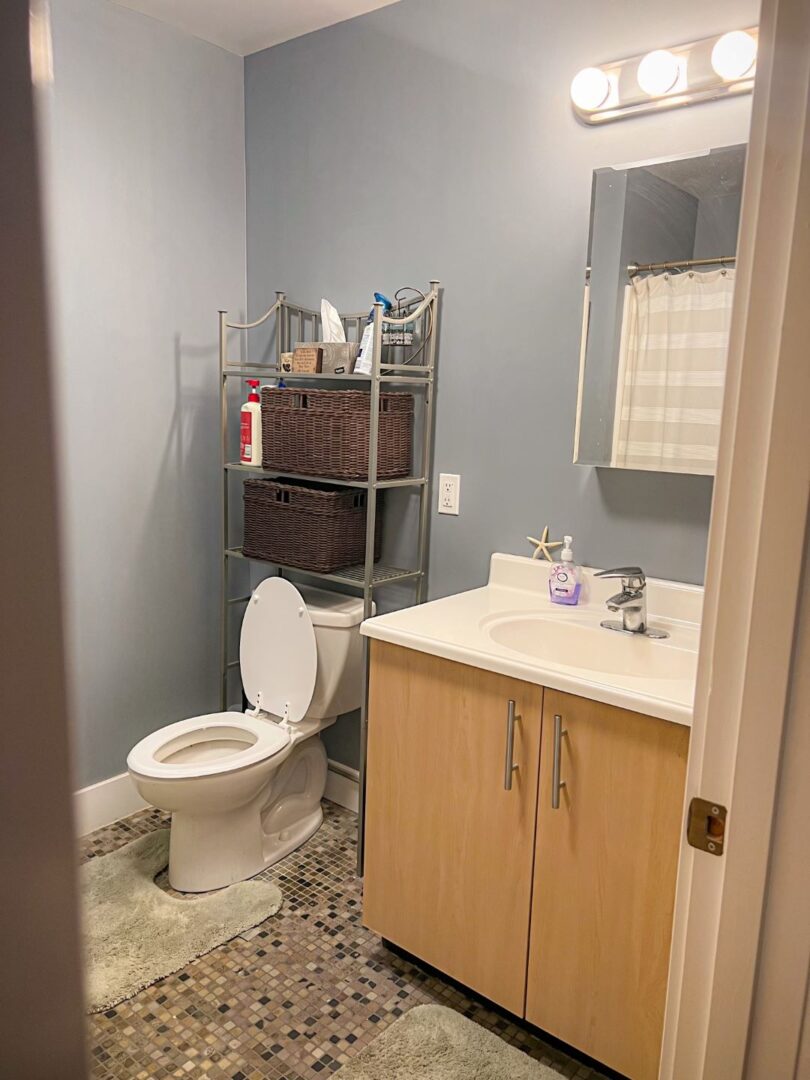 modern bathroom with tile floors and light blue walls