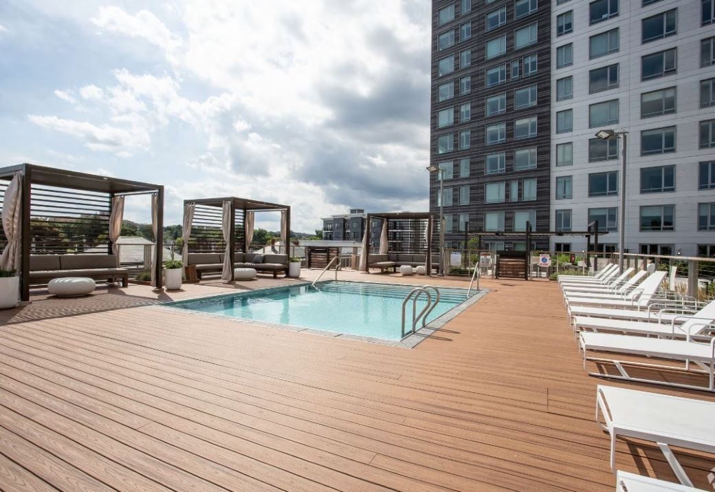 Big, Beautiful pool surrounded by outdoor deck/patio space