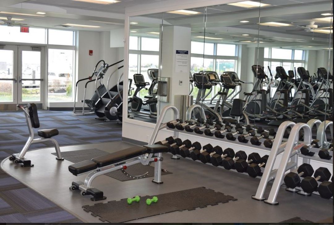 fitness center with an assortment of equipment